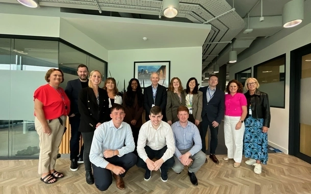 Group photo with graduate members and leadership team